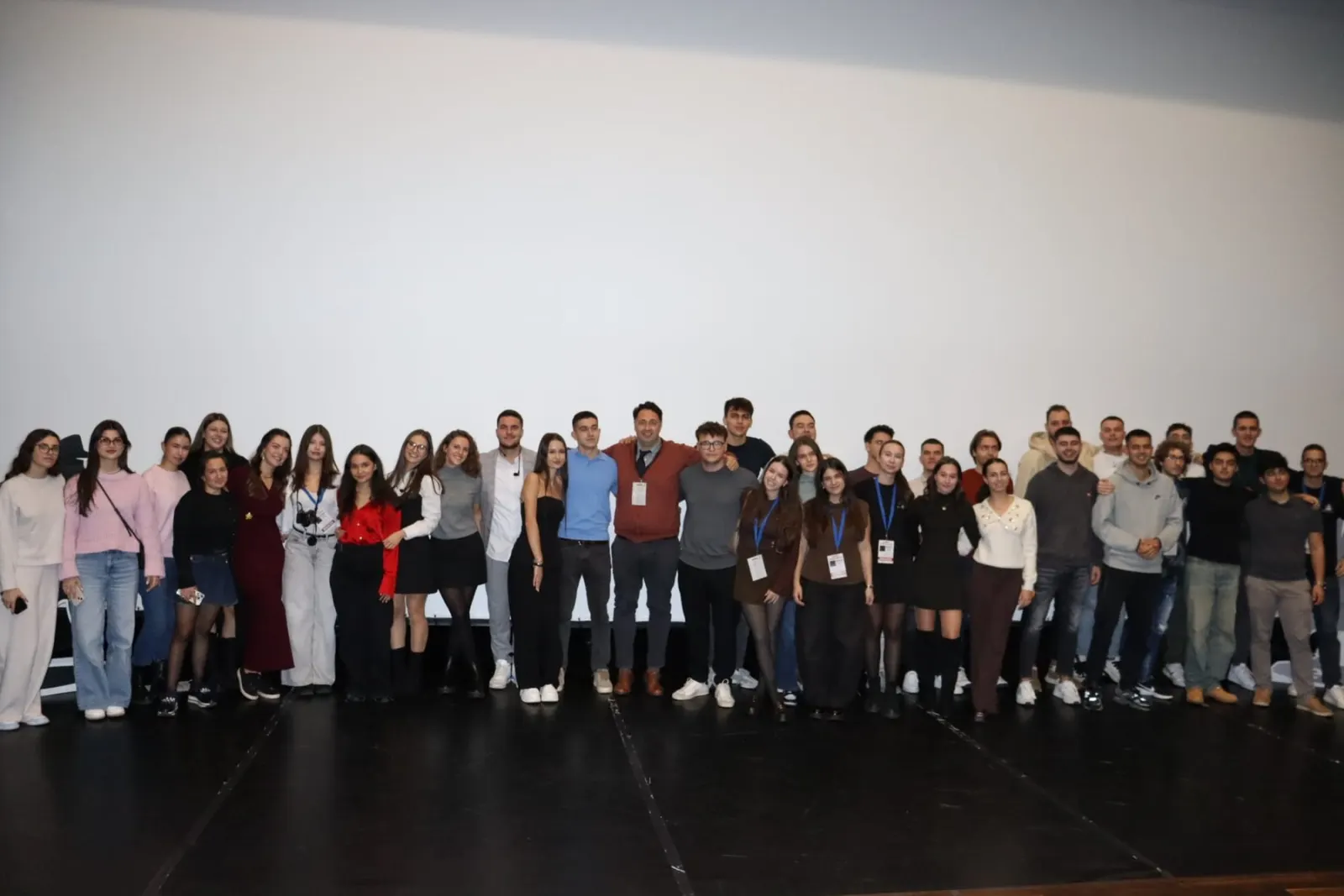 Participants, mentors and organisers of Business Challenge 2025 on stage